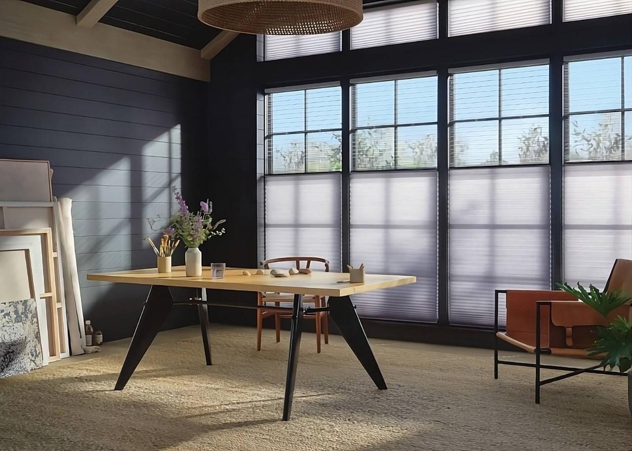 Hunter Douglas Duette® Cellular Shades as blind alternatives in a chic home art studio at WTI Inc. near Concord, MA